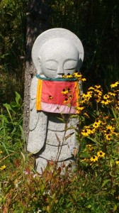 Jizo with red bib from the Gafton Peace Pagoda in upstate New York