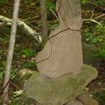 Small stone stupa marking trail to Grafton Peace Pagoda
