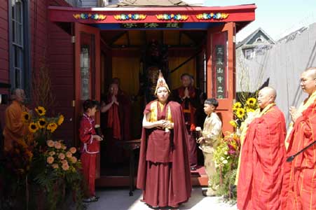 Akou Lamo Rinpoche performing Dharma at installation ceremony. Rinpoches and Dharma Mastersi guard statue.