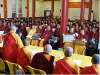 Masters of Dharma-Listening Sessions sitting with their robes on during the very solemn assembly.