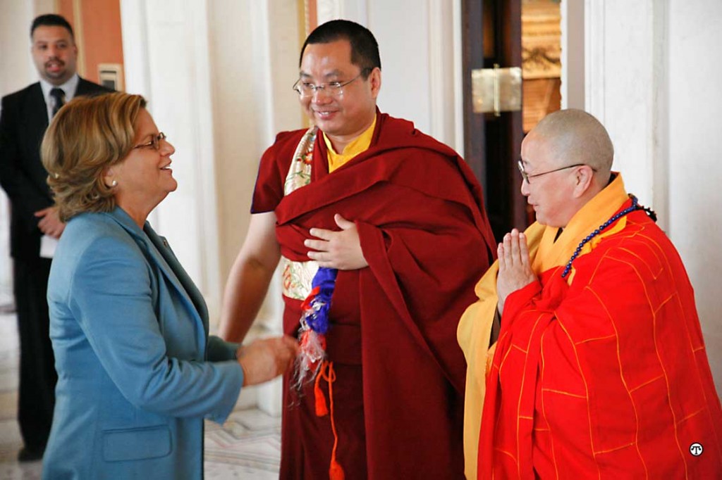 Congresswoman Ileana Ros-Lehtinen, who spoke at the ceremony in which the book was presented to the Library of Congress, talks to H.E. Denma Tsemang II Longzhi Tanpe Nyima Rinpoche, and Venerable Dharma Teacher Long, Hui. 