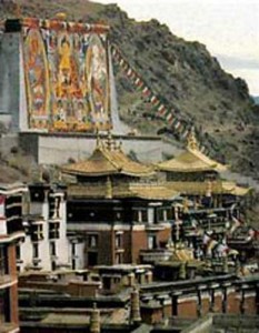 Unfolding of the Great Thangka at Tashilhunpo Monastery during annual Shodon (Yogurt) festival, Tibet. Tashilhunpo Monastery is located on the slopes of Mt. Niser in U-Tsang